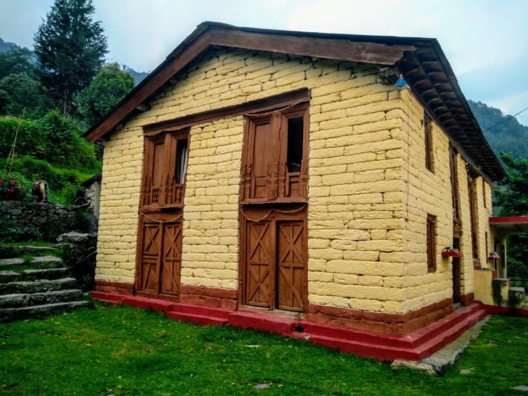cream coloured Kumaoni traditional house in sarmoli, Munsiyari, Pitthoragarh, Uttrakhand, India