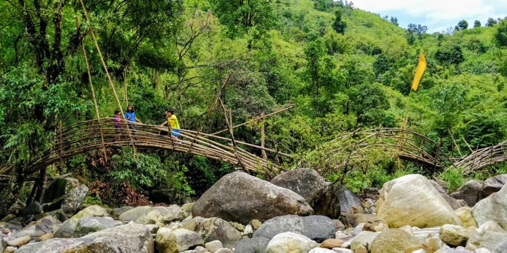 Mawryngkhang trek is a trek to the legendary King of Stones in Wahkhen village of Meghalaya. The Mawryngkhang trek involves walking on bamboo bridges over broomstick farms and deep gorges.Wahkhen village is located in the Pynursla Tehsil of East Khasi Hills district in Meghalaya, India. It is 42km away from Shillong.Shillong & Cherrapunji are popular tourist places of Meghalaya. #lighttravelaction #meghalaya #incredibleindia #offbeatindia #northeastindia #meghalayatravel #meghalayainhindi