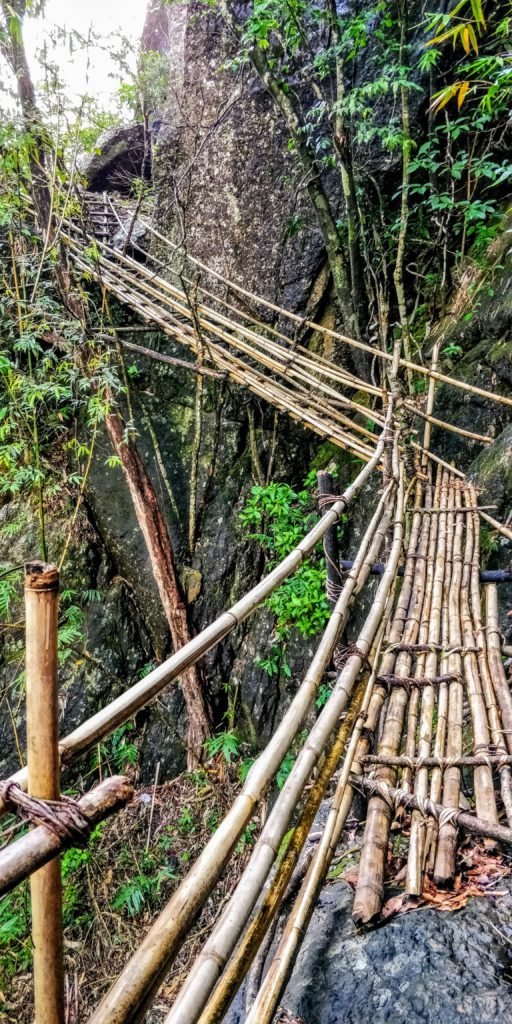 Mawryngkhang trek is a trek to the legendary King of Stones in Wahkhen village of Meghalaya. The Mawryngkhang trek involves walking on bamboo bridges over broomstick farms and deep gorges.Wahkhen village is located in the Pynursla Tehsil of East Khasi Hills district in Meghalaya, India. It is 42km away from Shillong.Shillong & Cherrapunji are popular tourist places of Meghalaya. #lighttravelaction #meghalaya #incredibleindia #offbeatindia #northeastindia #meghalayatravel #meghalayainhindi