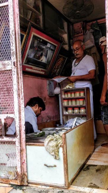 Inside government licensed bhang shop showing cannabis leaf products for sale