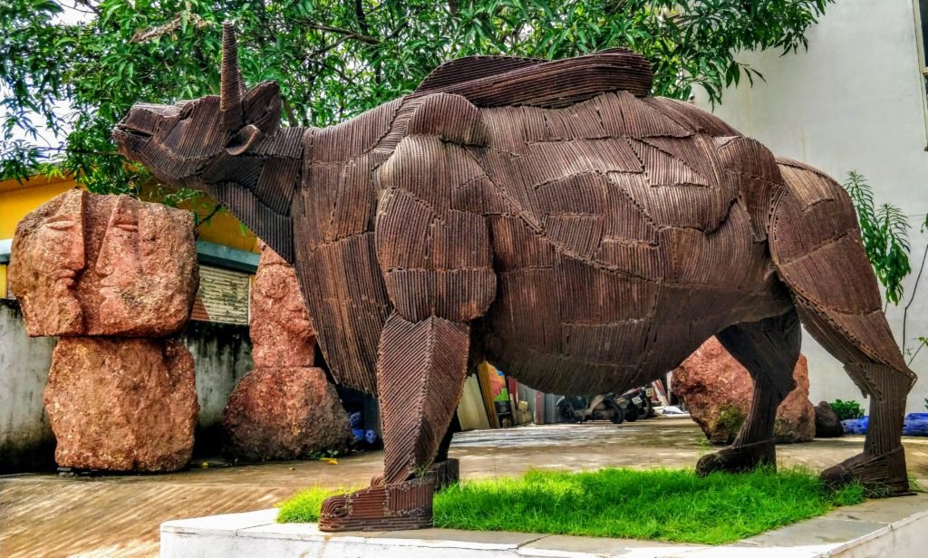 Entrance to Museum of Goa featuring a large welded steel sculpture of an Indian Bison (Gaur), the state animal of Goa, in the industrial estate of Pilerne