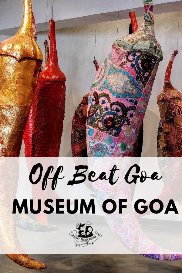 Colorful red chili pepper art installation at Museum of Goa, showcasing contemporary artistic interpretation of Goan spices and culinary culture