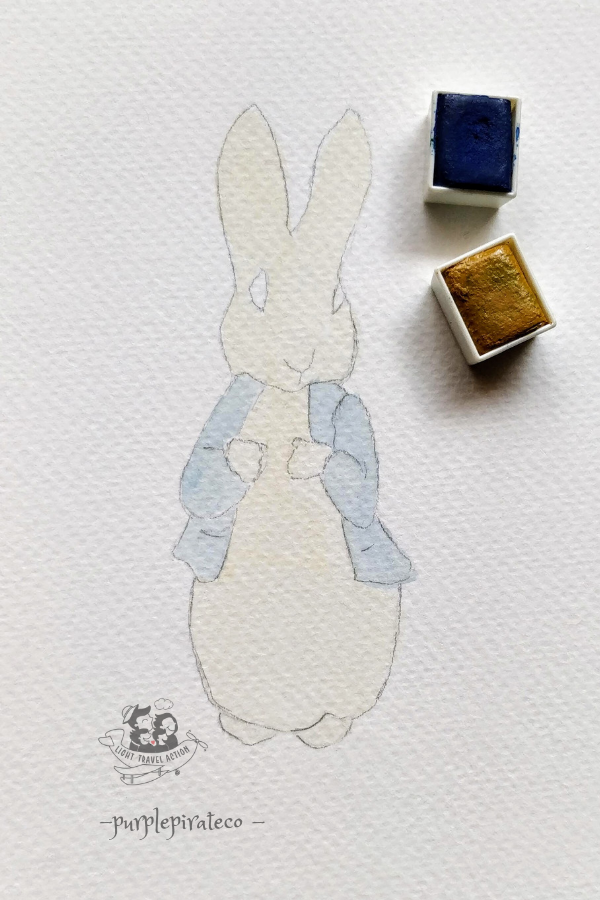 Very light wash of ochre added to the pencil sketch of peter rabbit. An equally light wash of blue for his blazer as well.