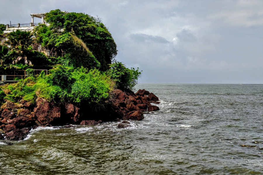 Dona Paula Mormugao Harbour Ferry boat service operating between October and May, showing the vessel against the backdrop of the Arabian Sea