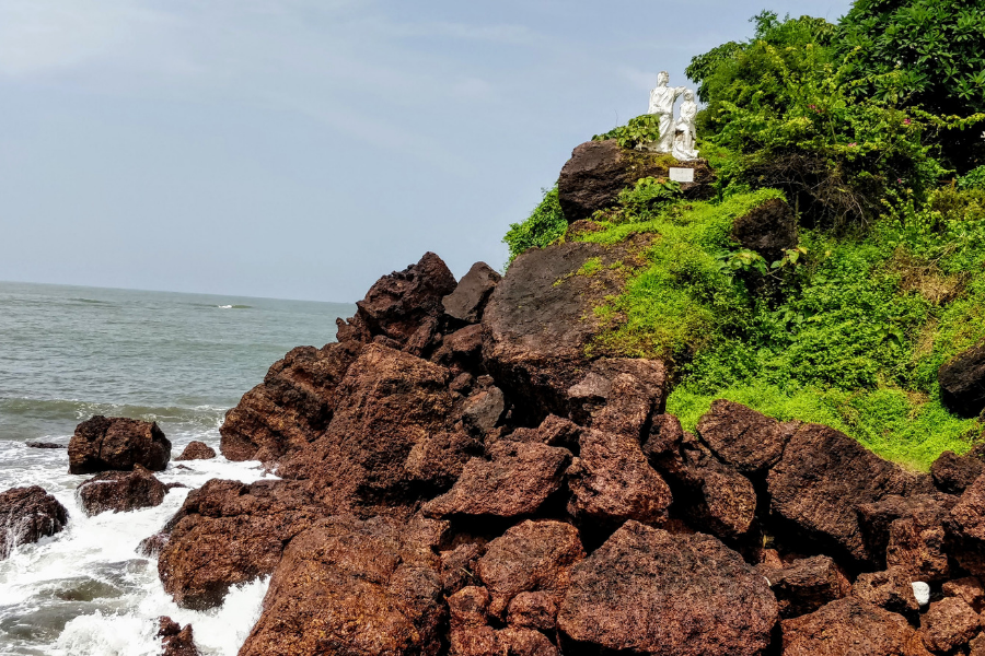 The iconic white marble Image of India statues at Dona Paula sculpted by Baroness Von Leistner in 1969, showing two figures looking east and west with the Ashoka Wheel between them