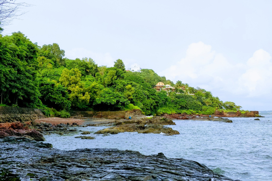 Instagram-worthy steps at Aguada Central Jail area with ocean backdrop, popular photo spot for tourists visiting Fort Aguada