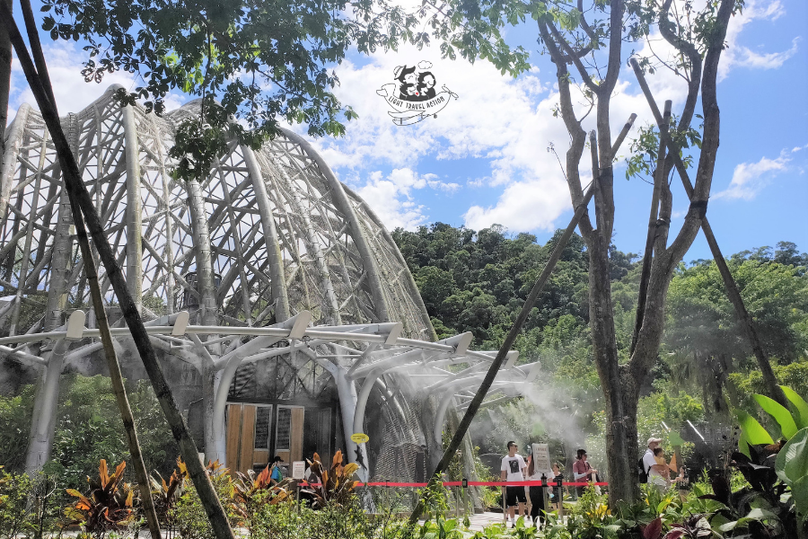 Exterior view of Pangolin Dome showing the distinctive 24-meter high transparent geodesic dome structure housing tropical rainforest habitat at Taipei Zoo