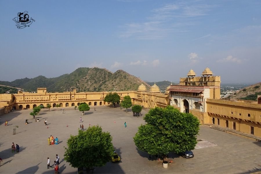 One of the top tourist attractions of Jaipur, the stunning Amer Palace Fort sits atop a small hill, and is located at a distance about 11 km from the main city. Built with pale yellow and pink sandstone, and with white marble, the magnificent Amer Fort is an extensive palace complex. Click to read things to know before your visit #lighttravelaction #amberfortjaipurphotography #amberfort #amberfortjaipur #amberfortphotography #amberfortjaipurarchitecture #amberfortjaipurindia #amerfortjaipurindia