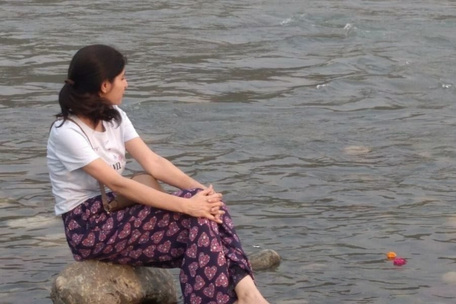 sitting on the banks of river Ganga